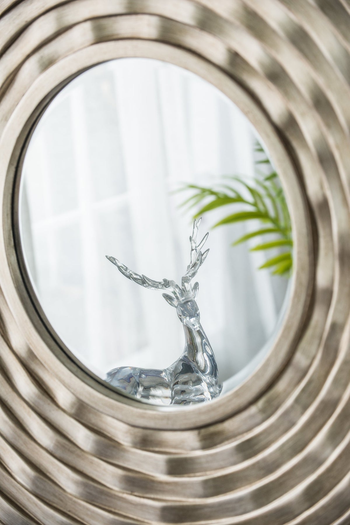 Round Sculpted Silver Wall Mirror with Beveled Glass